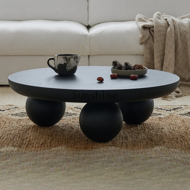 

Retro black solid wood round coffee table wabi sabi creative spherical round table
