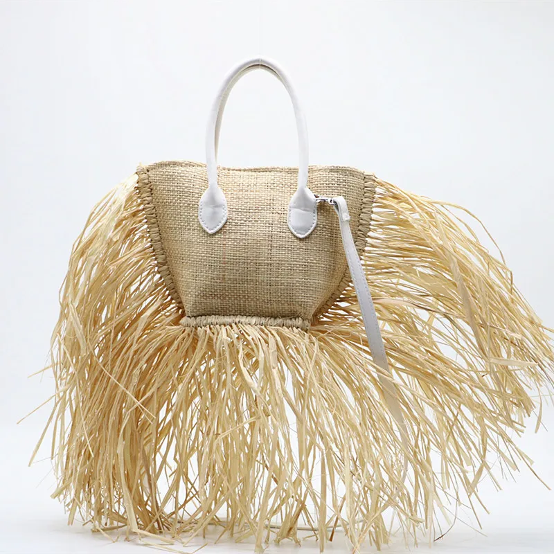 The new raffia woven bag shoulder slanting straw bag 2024 new high quality tassel bag, straw handbag for women,