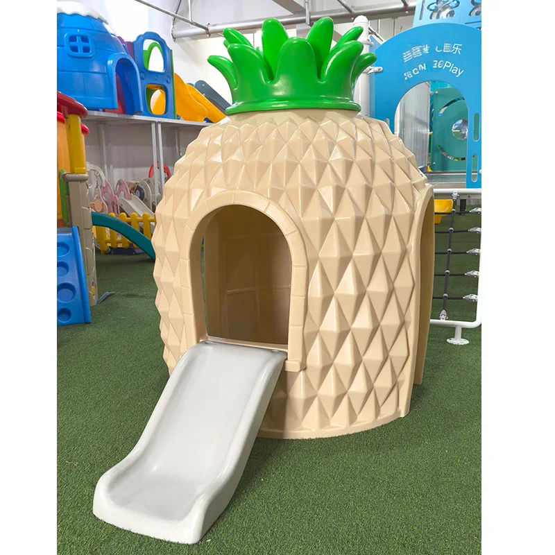 The pineapple house has a peculiar shape, with two arched doors and a small sliding door for children to play with