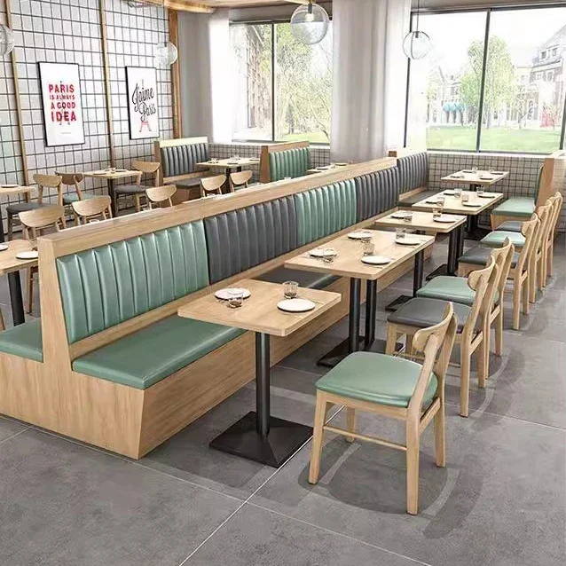 

A Wooden dining room furniture set dining chairs and semi-circular booth seating, with restaurant fast food table