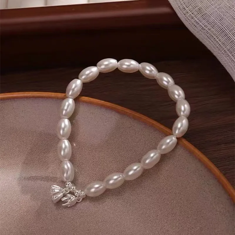 

Pearl bracelet lotus seed transfer bead bracelet female niche design high-grade sense of light luxury simple exquisite hand jewe