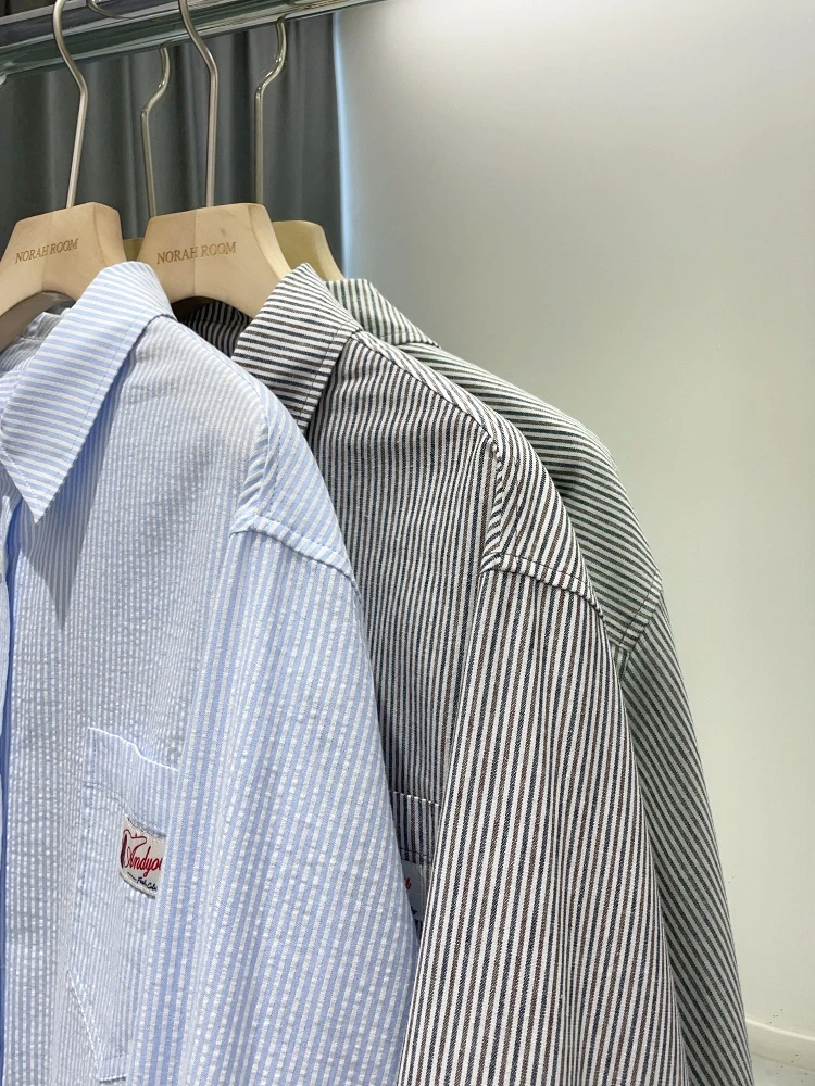 Nolara ربيع 2025 جديد فضفاض الملمس مخطط طويل Sve irt المرأة عادية Sle القطن الخالص مستقيم قطع طوق زر