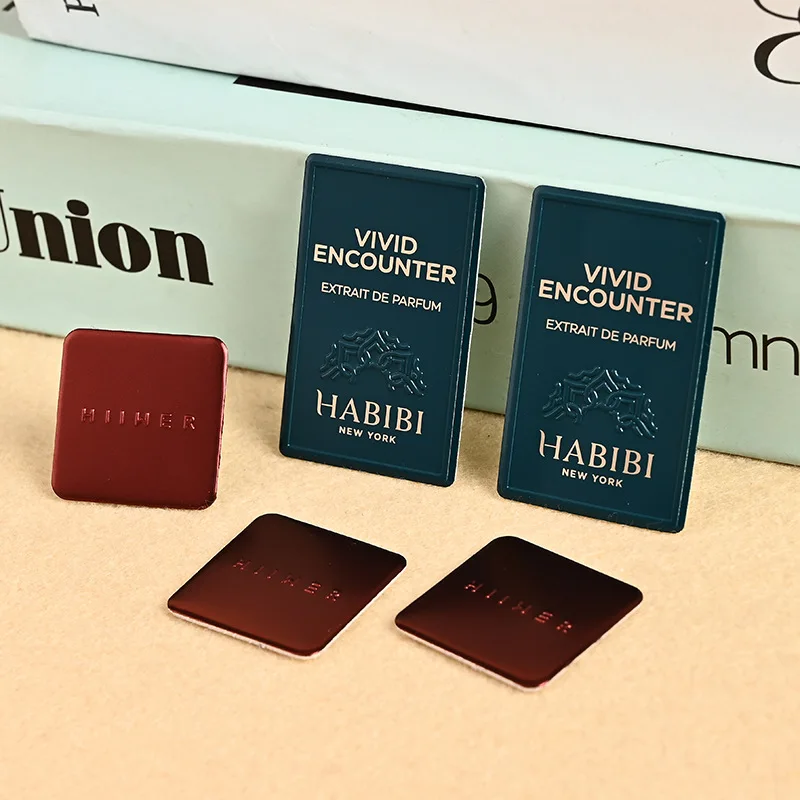 

Custom Die-Cast Trademark Custom Metal Sign Cosmetics Perfume Label Hollow Zinc Alloy Electroplated Nameplate Whole