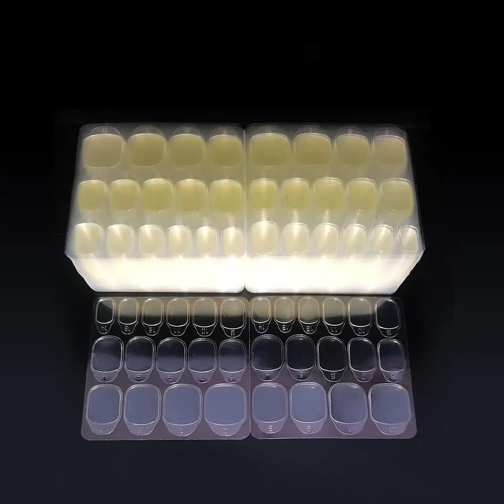 Versione aggiornata Non danneggiano mai le tue unghie Punta falsa Colla per unghie Sostituzione Gelatina impermeabile Nail Art Stiers Profional 24 adesivi