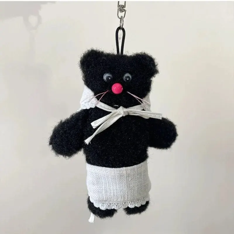 2024 carino orso nero grembiule copricapo peluche portachiavi Kawaii zaino ciondolo moda auto portachiavi ragazzo e ragazze donne accessori borsa