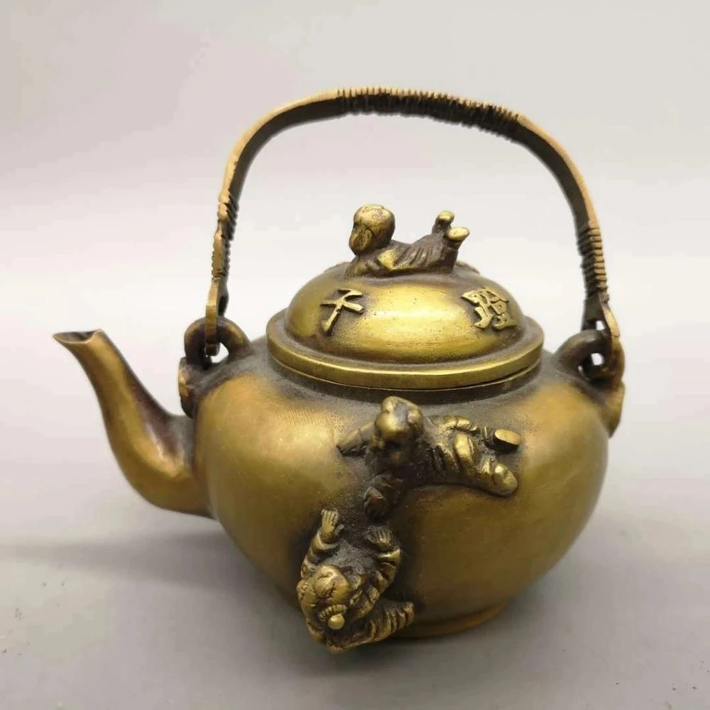 

Chinese Pure Brass Children Teapot Statue