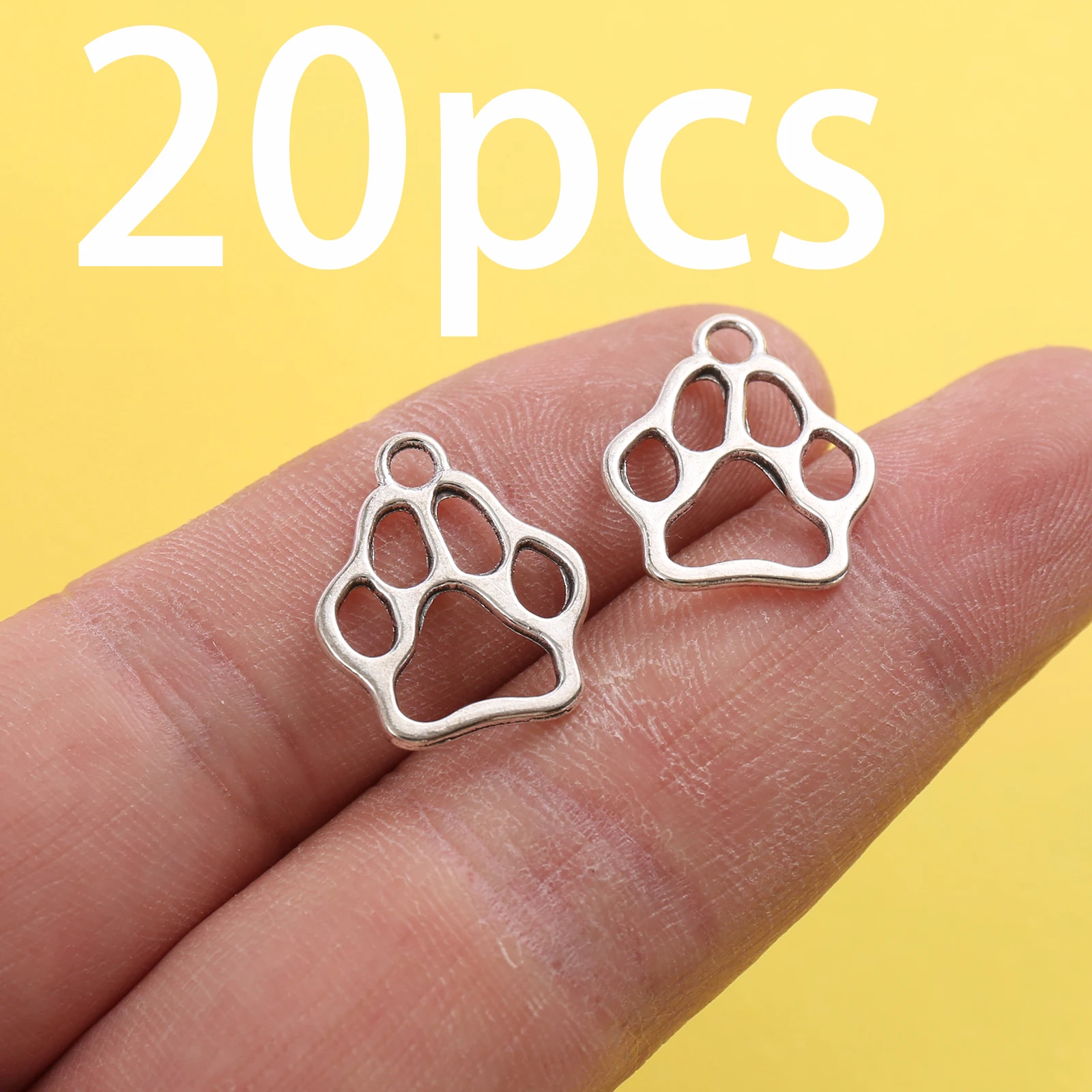 20 Pieces of Vintage-Style Hollow Claw Print Single-Hole Pendants, Featuring Smooth Hollow Lines in the Shape of a Cat Paw, with Built-In Hanging Loops, Suitable for DIY Bracelets, Earrings, Necklaces, and Niche Handmade Beading Accessories