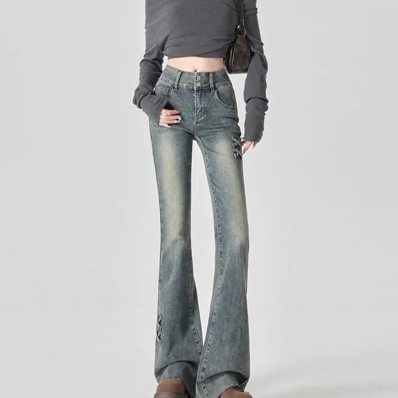 Calça jeans feminina vintage com lavagem a ácido, cintura alta, desgastada, detalhe cruzado, bainha dividida, y2k, streetwear 2025