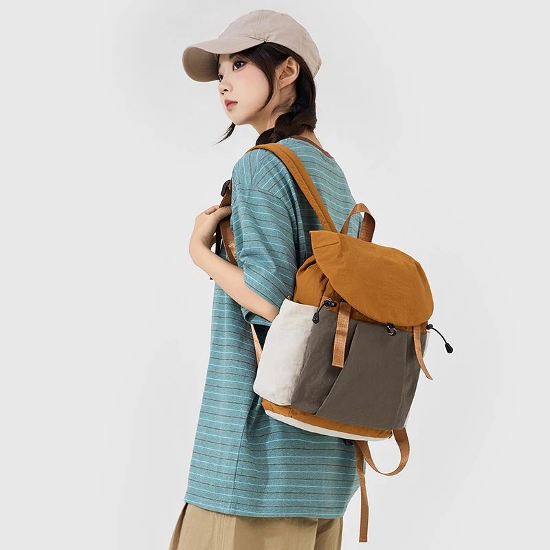 Light Luxury School Bag for Junior High School Students, Lightweight, Weight-Reducing, Waterproof, Large Capacity, Color-Blocking Backpack for High School Students, College Students, and Elementary School Students