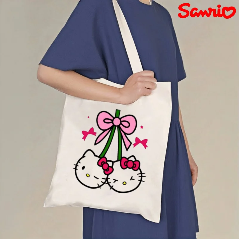 1 bolso de lona Sanrio Hello Kitty Cherry, bonito bolso de hombro informal con estampado de lazo, bolso reutilizable ecológico