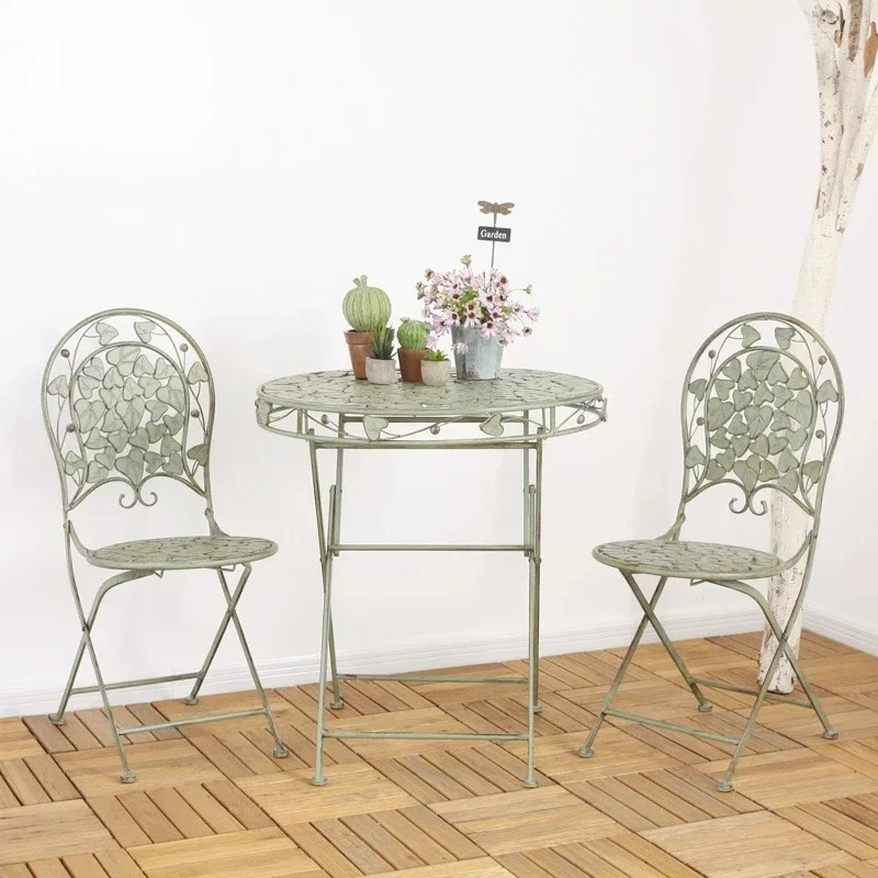 American country garden outdoor tables and chairs wrought iron old terrace balcony leaf shape