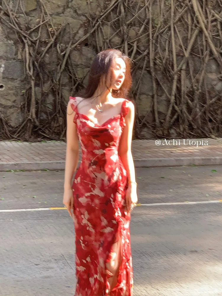 

A long slit dress with red georgette floral fringe halter top and wavy fringes