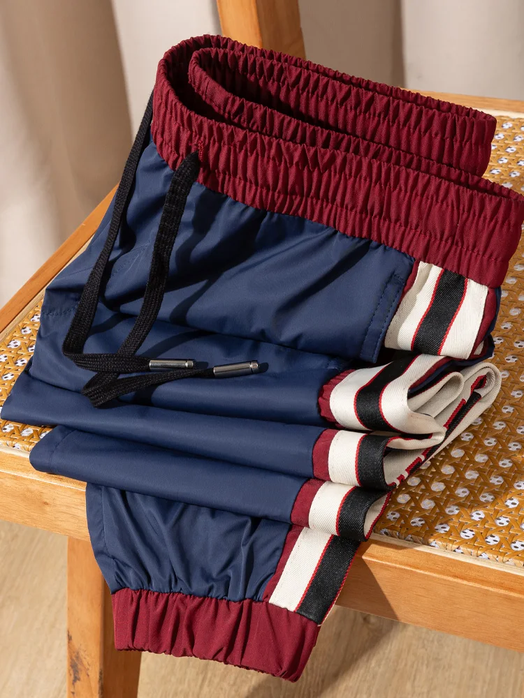 

Мужские спортивные брюки из лёгкого шелка, облегающие, с эластичным поясом, быстросохнущие, в стиле casual, молодёжный тренд, бренд.