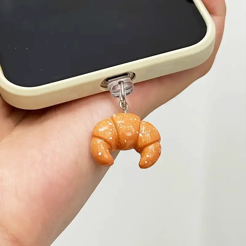 

1pc Cute Resin Croissant Charm Pendant Decorative Mobile Phone Dust Plug, Suitable for USB-C & Lightening Port