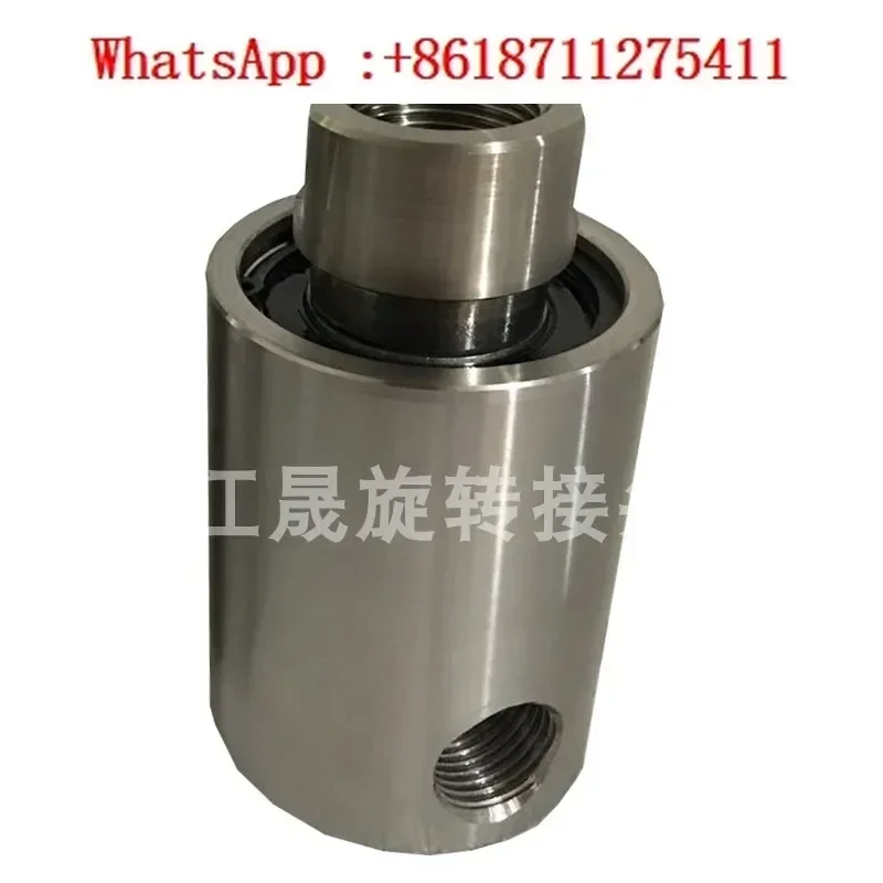 

Automatic washing machine water pressure driven rotary joint