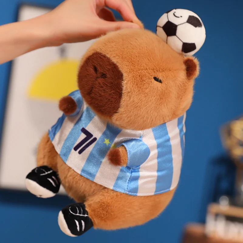

1Pc 22cm Kawaii Capybara Plush Toy Wears Football and Basketball Jerseys Cartoon Capibara with Balls Birthday Xmas Gift