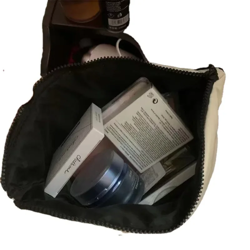 Bolsa de maquillaje con fragancia pequeña de algodón de plumón de alta calidad para mujer, bolsa de almacenamiento de viaje portátil para lavado y aseo