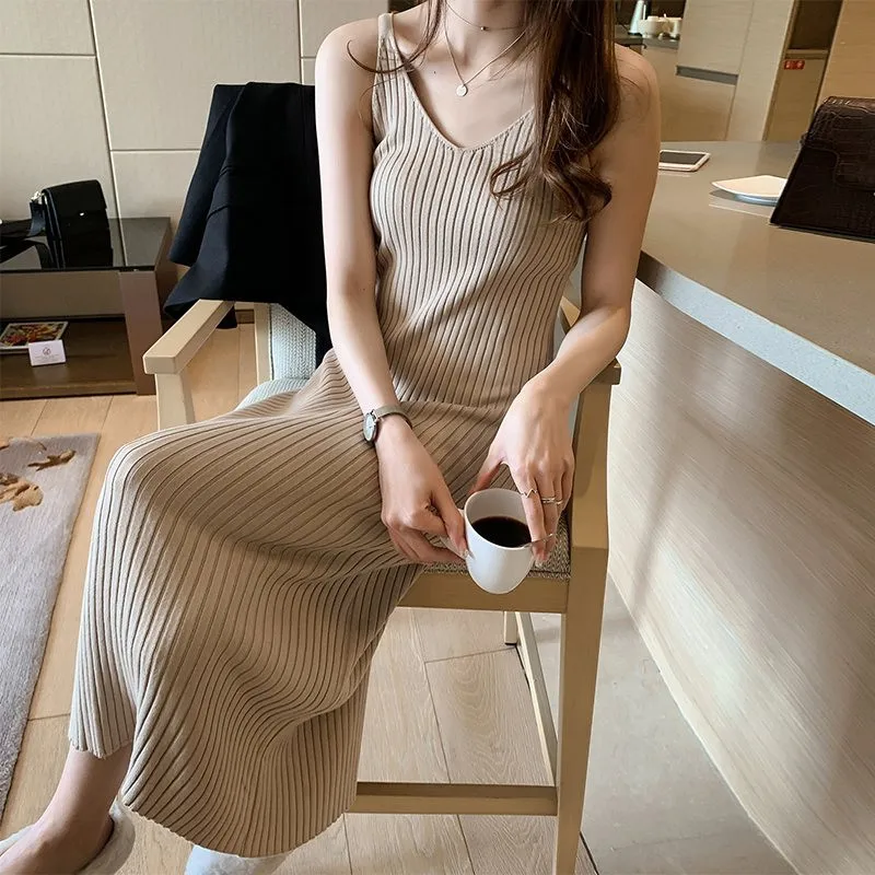 

New spring and autumn women's solid color ice silk knitted suspender dress slim temperament V-neck bottoming skirt Joker dress