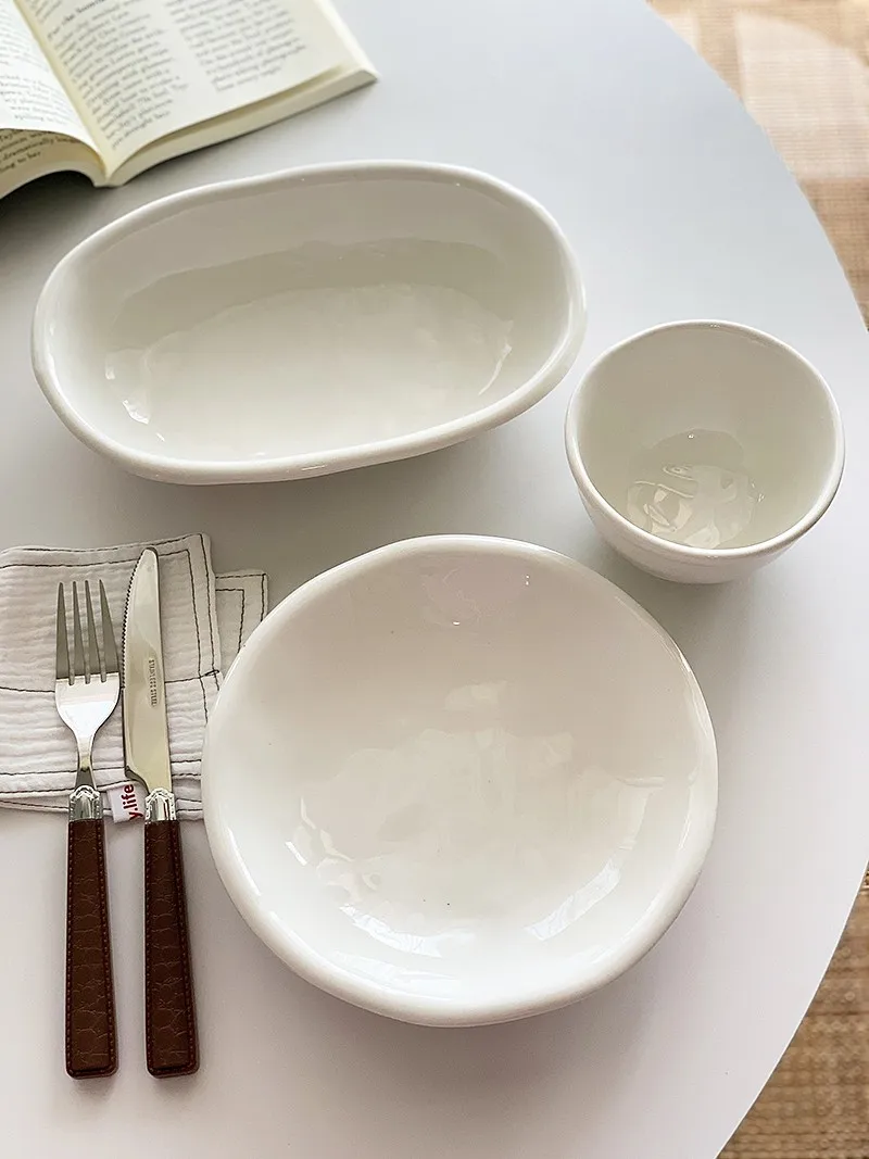 

Anmuli Nordic mat Handmade Irregular Pure White Cerc Oval Deep Di Plate Dining Plate Deep Di Porcelain Plate