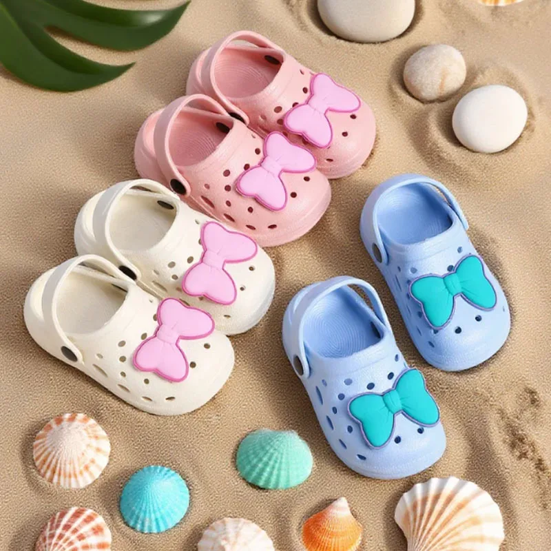 

DIY Bow Kids Clogs Fun Cute Cartoon Slip Outdoor Beach Garden Home Shoes Versatile Comfortable Sandal Anti Slip Slippers