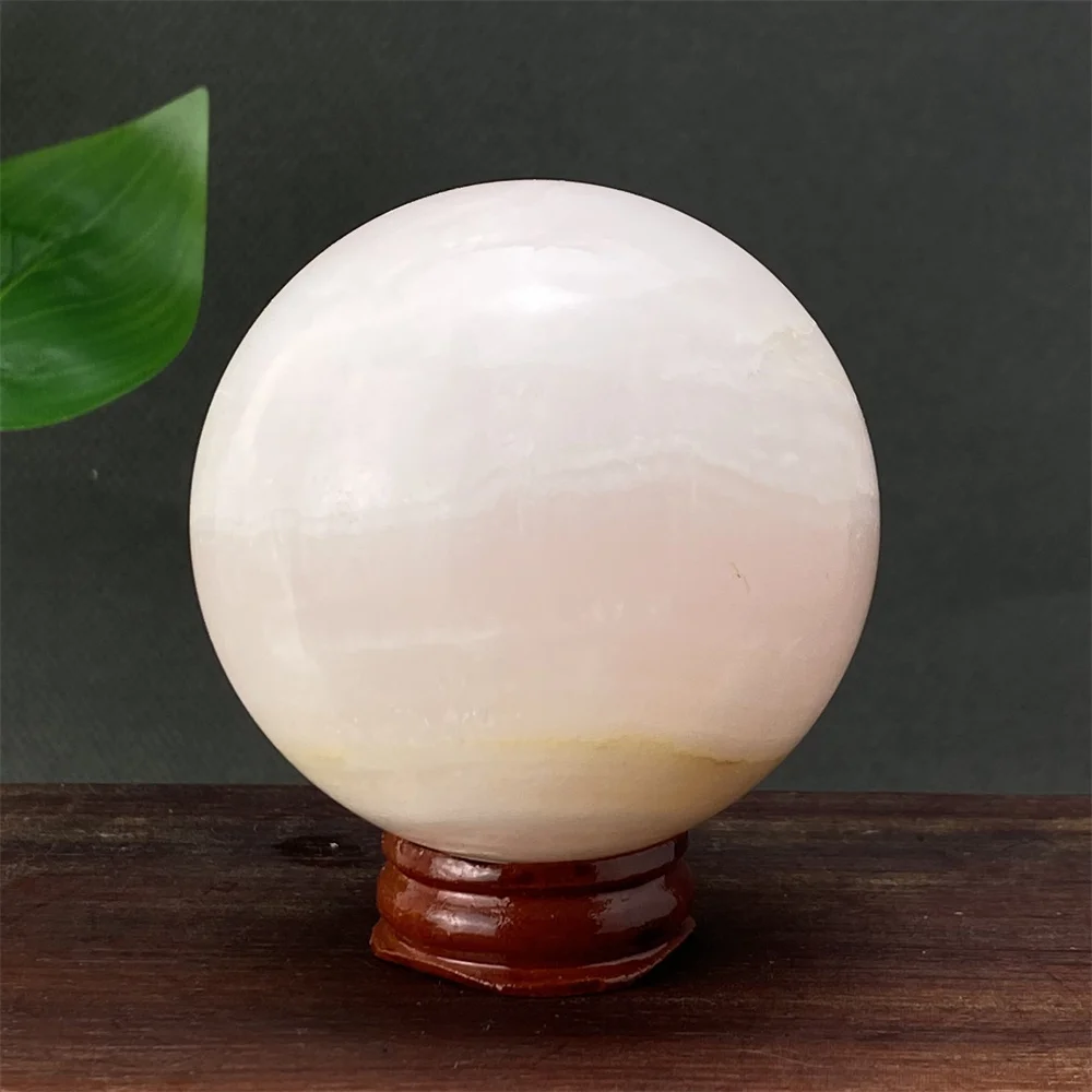 

Natural Pink Calcite Crystal Ball with Bracket Transparent Optical Home Decoration Ball for Witchcraft And Home Decor