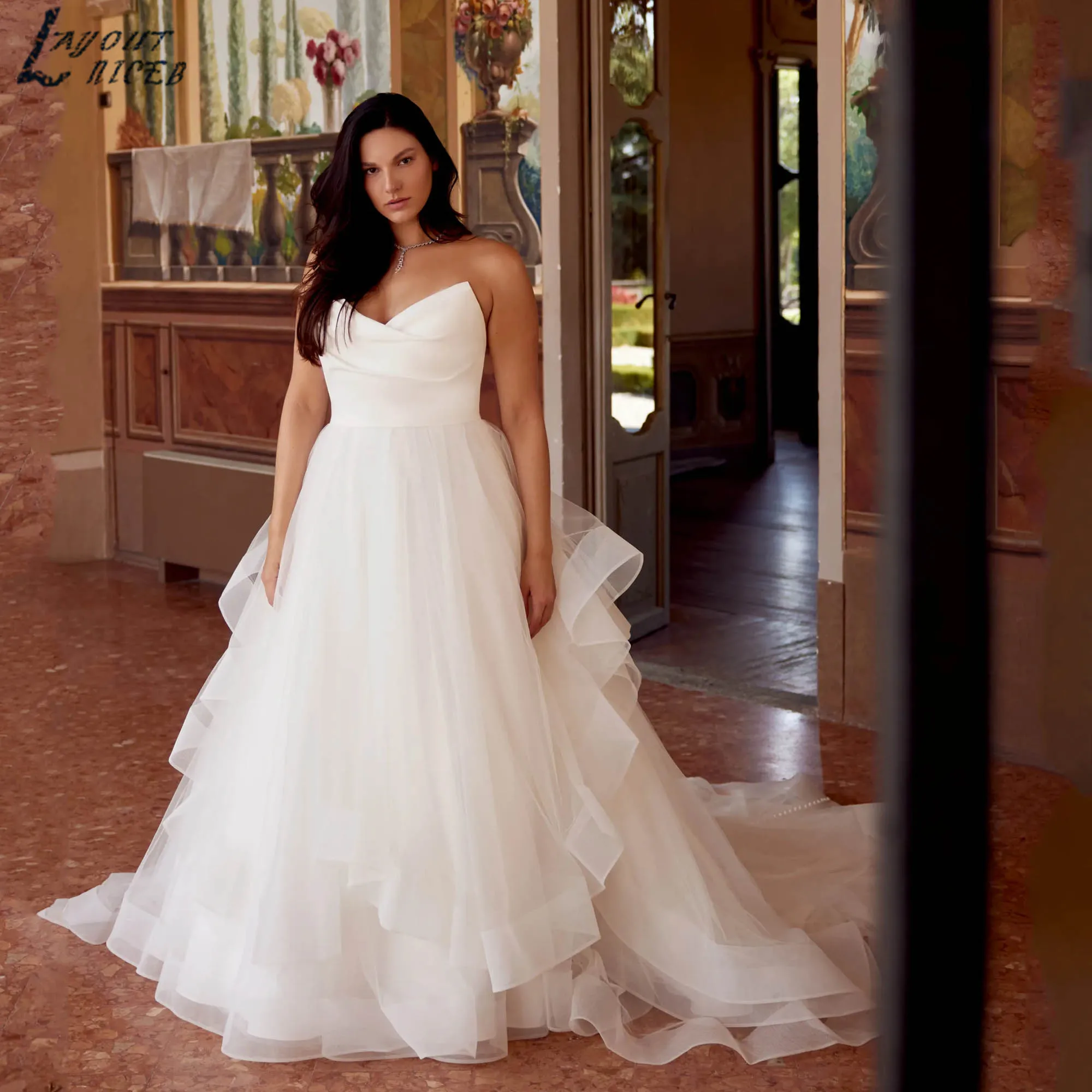 

Платья больших размеров с тюлевой юбкой с рюшами Свадебные платья без бретелек для невесты Простота трапециевидной формы с открытой спиной Свадебные платья de novia по индивидуальному заказу