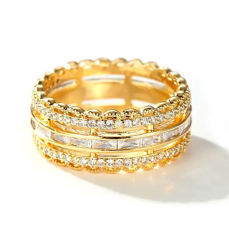 Huitan Ring mit vollständig glänzendem Zirkonia für Damen, goldfarben, breites Band, luxuriöses Hochzeits- und Party-Accessoire, elegantes Schmuckgeschenk