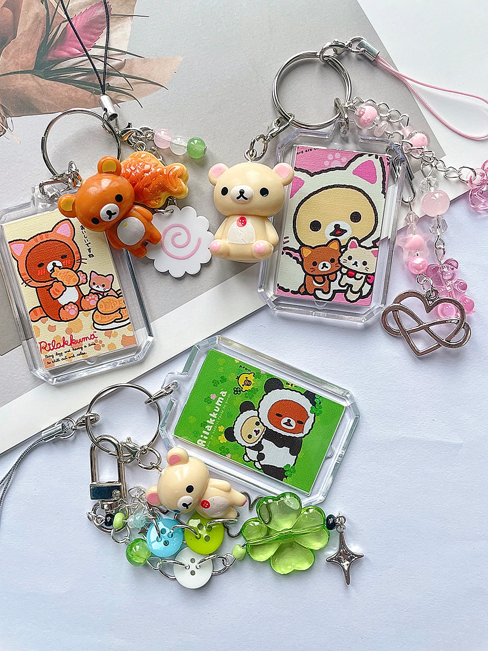 

Kawaii Rilakkuma Phone Rope Chain Keyrings Easy Bear Doll Taiyaki Four Leaf Lovers Lucky Key Buckle Mobile Bag Key Pendants Gift