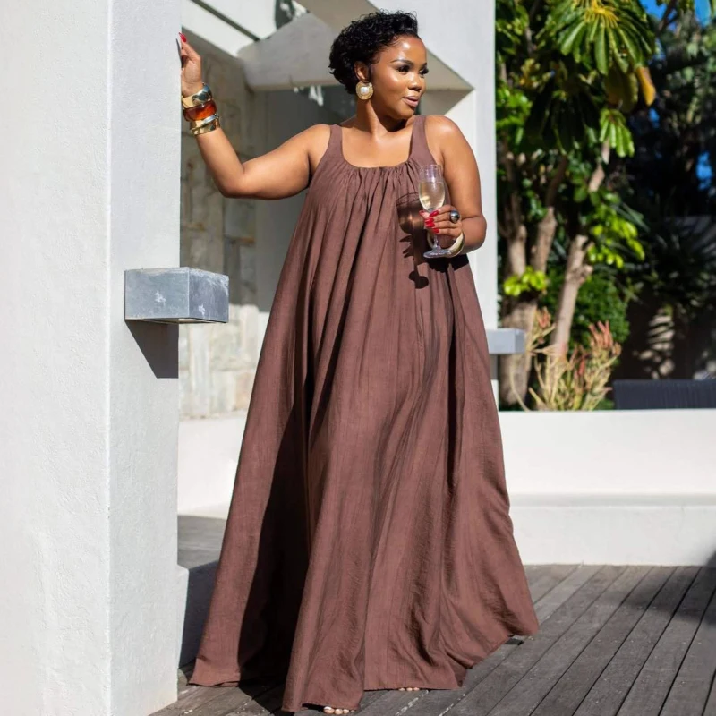

Элегантное новое африканское модное женское летнее повседневное платье без бретелек, однотонное, свободного кроя, с широким подолом, длинное.
