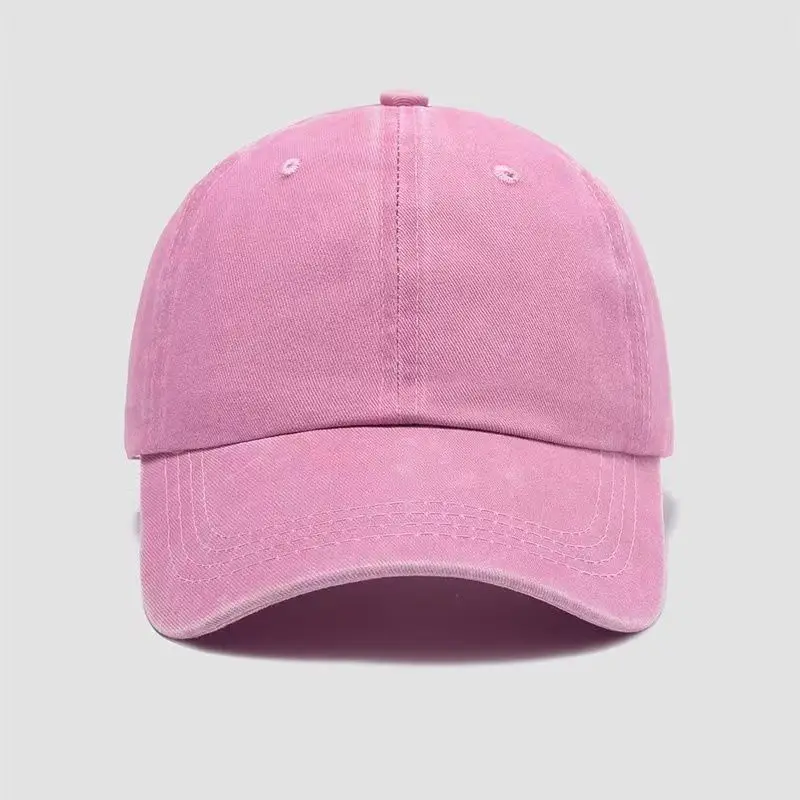 Solid color distressed washed retro baseball cap with multiple colors available for both men and women in a versatile style