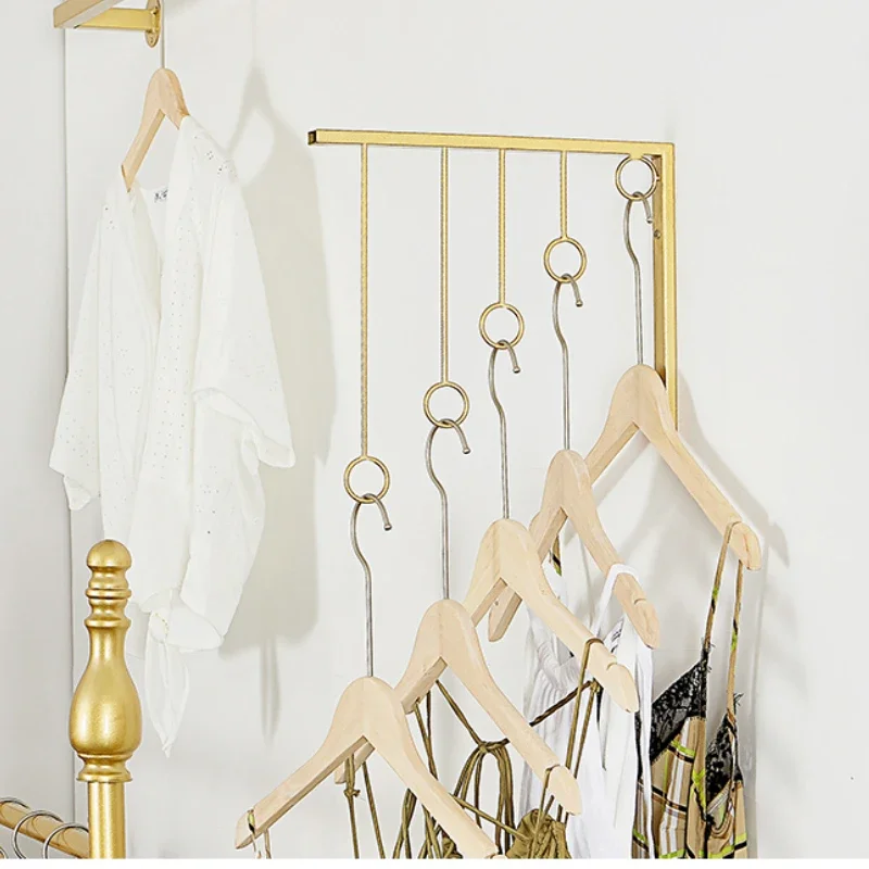 

Gold Clothing Display Rack Iron Art Shelf with Wall Hooks Garment Show Organizer Space-Saving Cloakroom Hanger Display