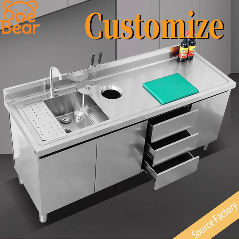 Custom stainless steel kitchen cabinets with scratch-resistant countertops and workbenches.