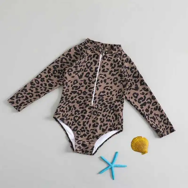 maio-infantil-de-manga-longa-qui-dry-com-protecao-solar-para-ferias-em-Aguas-termais-roupa-de-mergulho-fashion-para-criancas
