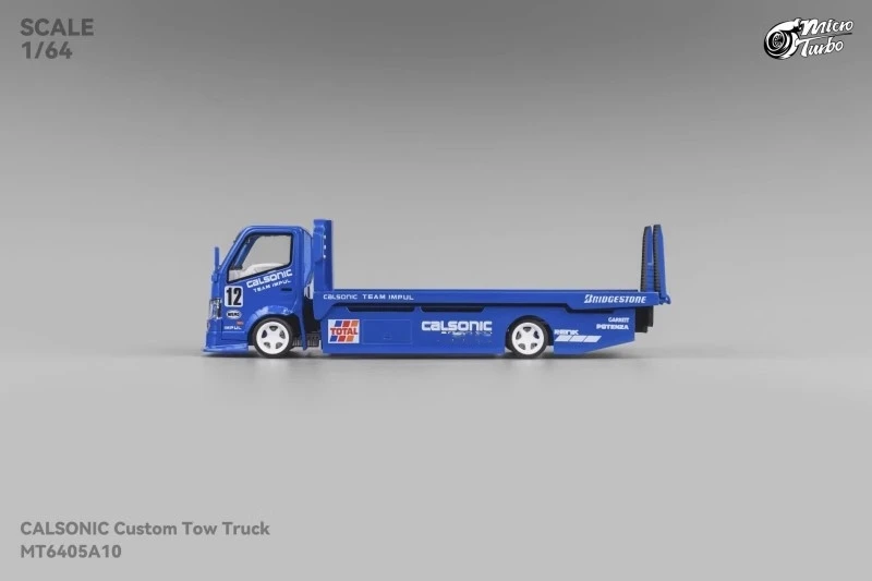 

Литая под давлением модель автомобиля Micro Turbo 1:64 с планшетной кроватью металлик синего цвета в 2025 году