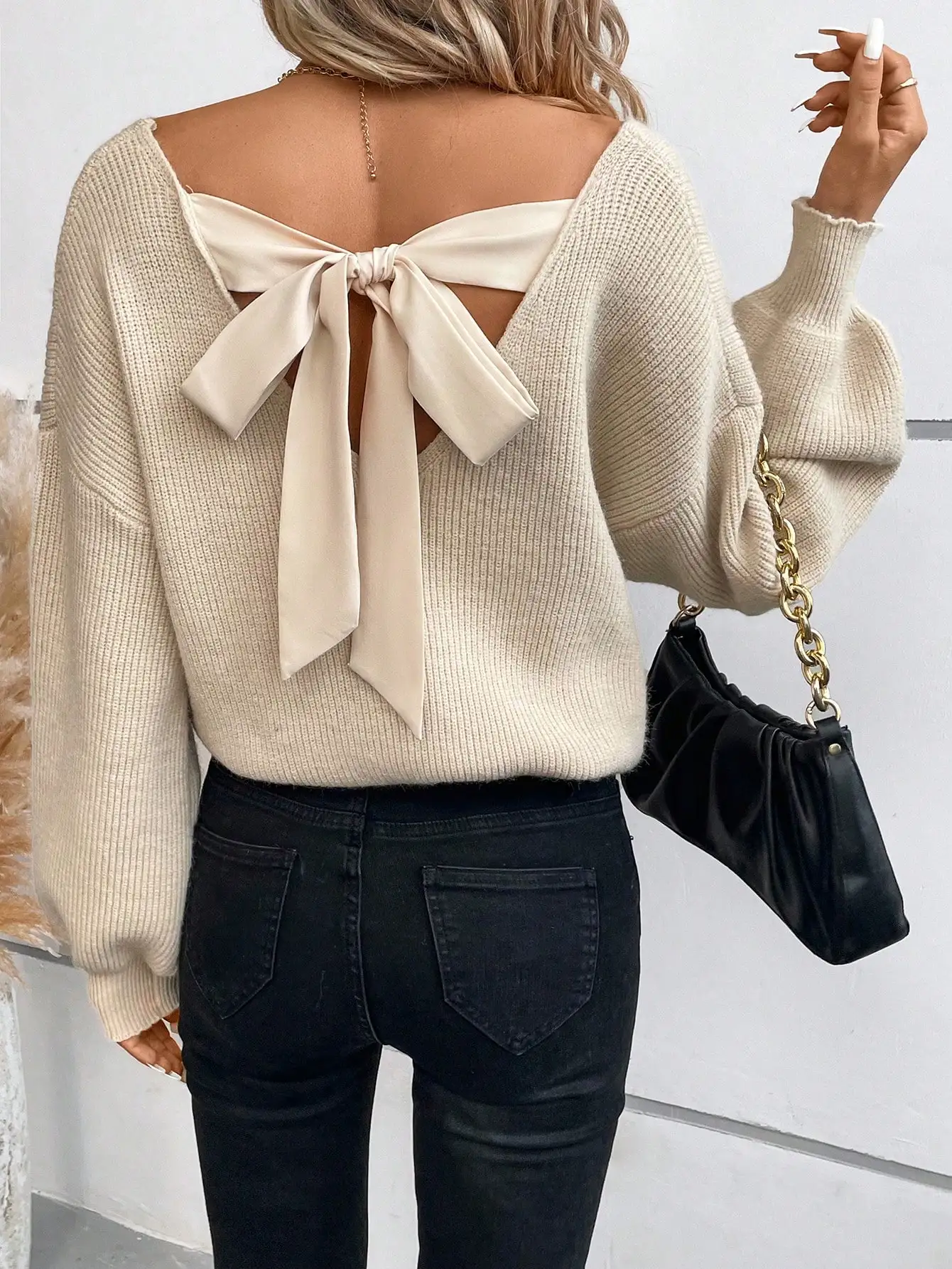 

Women's Knit Pullover with Back Bow Tie and Drop Shoulder Design