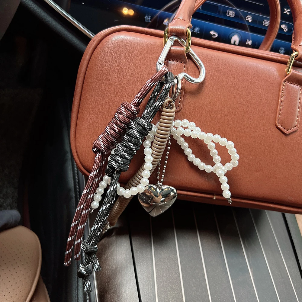 Creative Niche Mobile Phone Lanyard Woven Wristband Short Hand Woven Ropes Pearl Bow Sweet Bag Hanging Decoration Bag Pendant