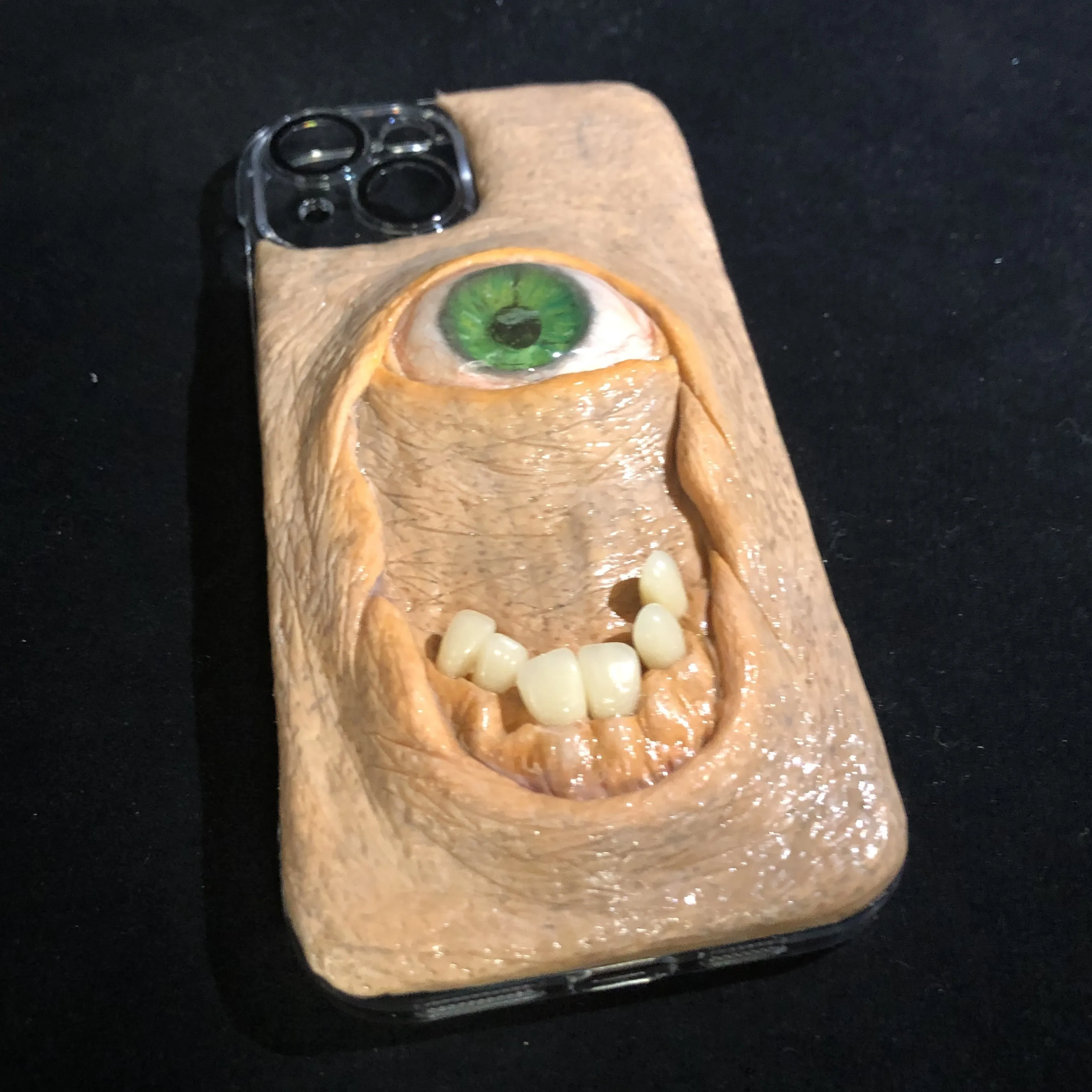 

4050 Discounts iPhone 15 Phone Cases, Handmade 3D Stereo Cthulhu Style, Cyclops Face, Green Eyes, Horror Style Phone Cases