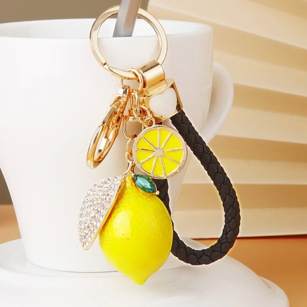 Süßer Zitronen-Schlüsselanhänger aus Legierung, kreativer Fruchtform-Anhänger mit geflochtenem Seil, Taschenanhänger, 3D-Metall-Schlüsselring, Geschenk – Detail 5