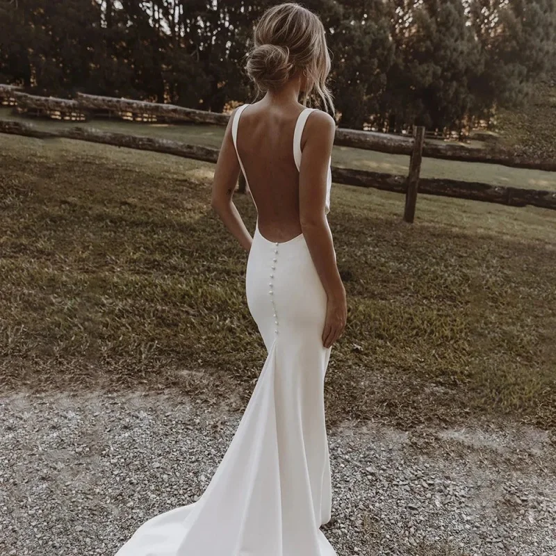 

Customized Simple Mermaid Wedding Dresses For Women Buttons Wedding Party Dress With Bow Sexy Backless Long Bridal Gown