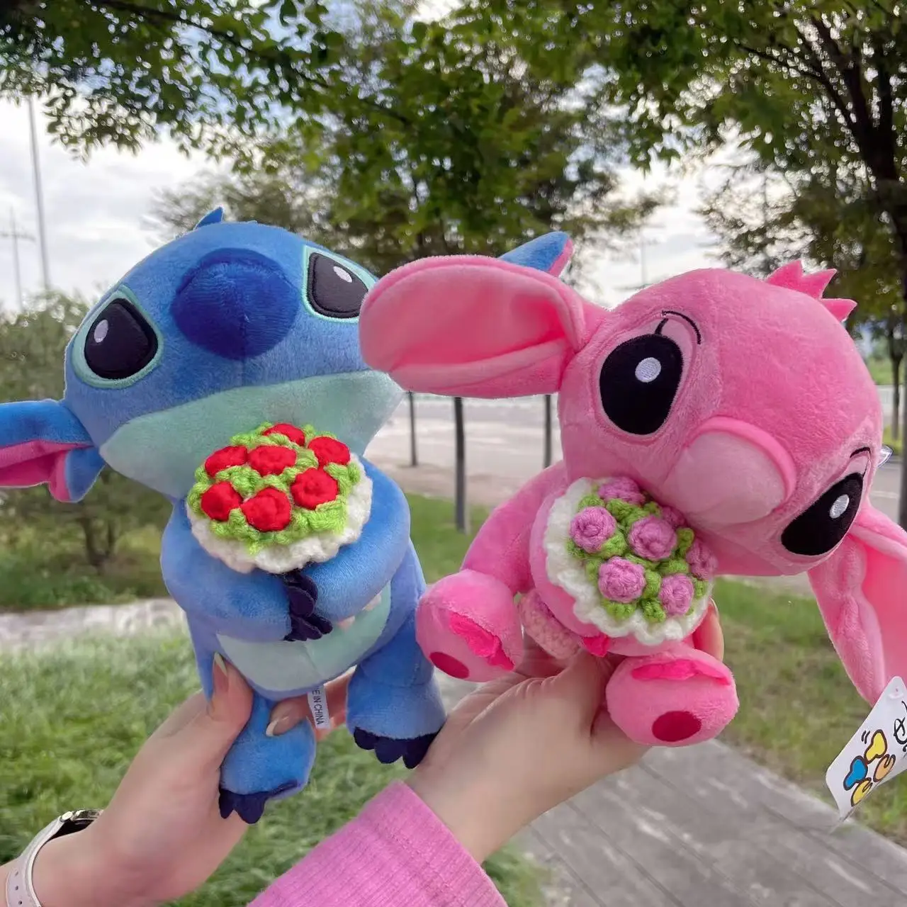 Anime Lilo & Stitch coppia modelli Cartoon farcito peluche bambole Anime peluche giocattoli per bambini ciondolo giocattoli Kawaii bambini regalo di compleanno