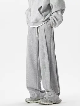 กางเกงวอร์มขาบานสไตล์เกาหลีสำหรับผู้ชายเสื้อผ้าแนวสตรีทสีพื้นแบบลำลองทรงหลวม2024แฟชั่นฤดูใบไม้ผลิฤดูใบไม้ร่วง