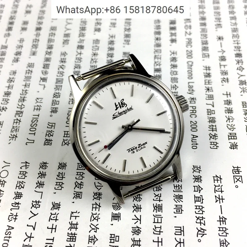 Shanghai Watch Factory produces a medium-sized manual mechanical watch with a diameter of 32MM and comes with a strap