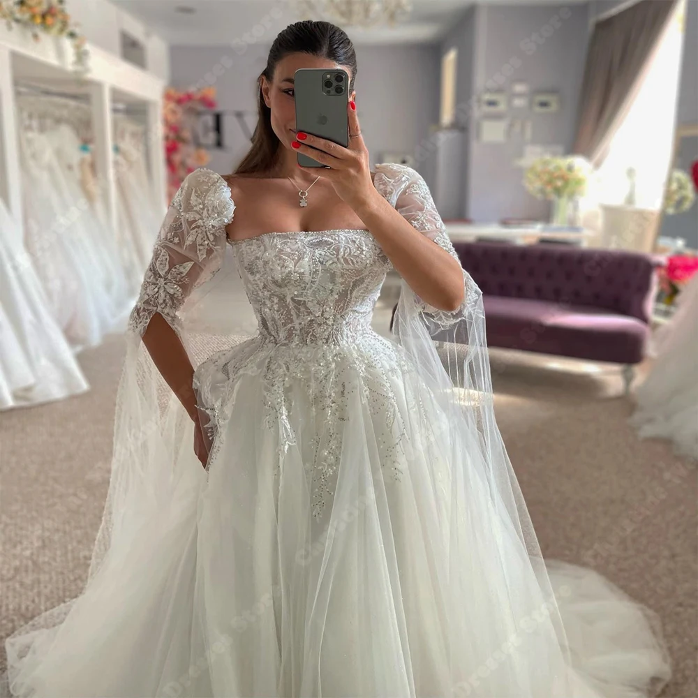 Urocze białe suknie ślubne damskie koronkowe o linii druk kwiatowy o długości do mopowania eleganckie suknie ślubne księżniczki Vestidos De Novias