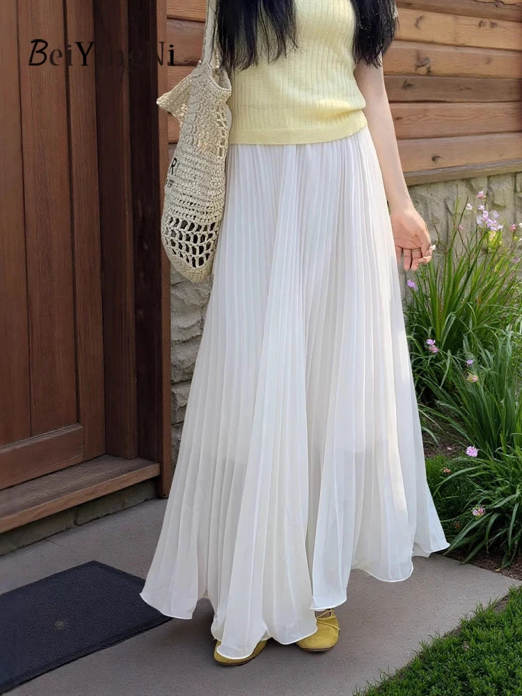 Saia Maxi de Chiffon Beiyingni 2026 para o Verão, Feminina, Cor Sólida, Estilo Casual e Delicado, Saia Longa Plissada, Saia de Praia para Férias
