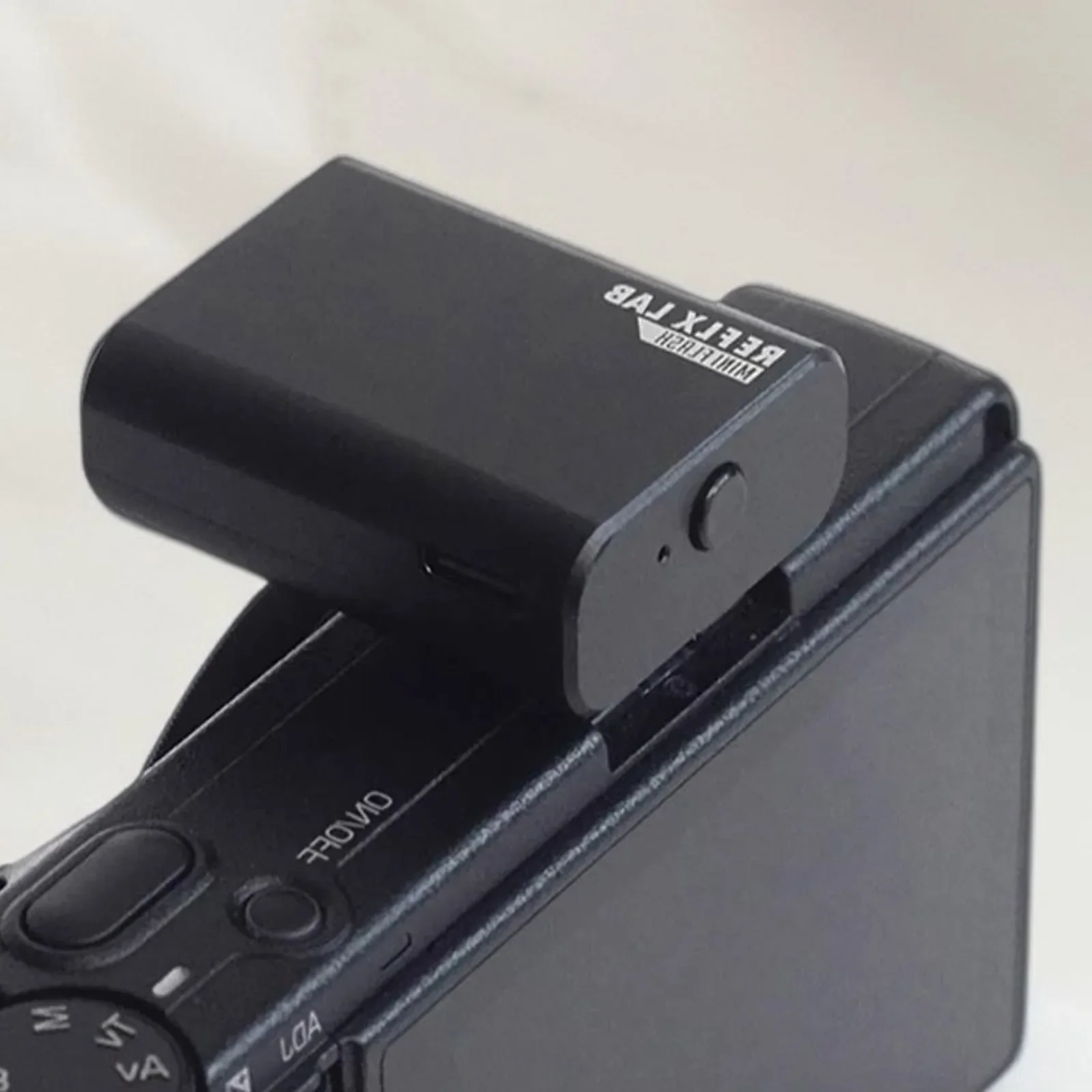 فلاش كاميرا صغير Reflx Lab Mini Flash Lite مع غلاف بلاستيكي أسود للكاميرات الرقمية والأفلام