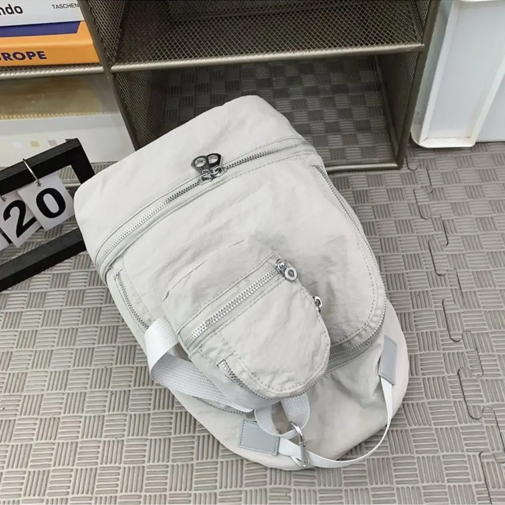 Simpatica mini zaino in nylon tinta unita, mini borsa a tracolla, portafoglio piccolo, borsa da appendere in stile coreano