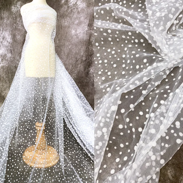 Hermoso copo de nieve blanco transparente flocado de lunares tela de diseñador de ropa de malla de lunares