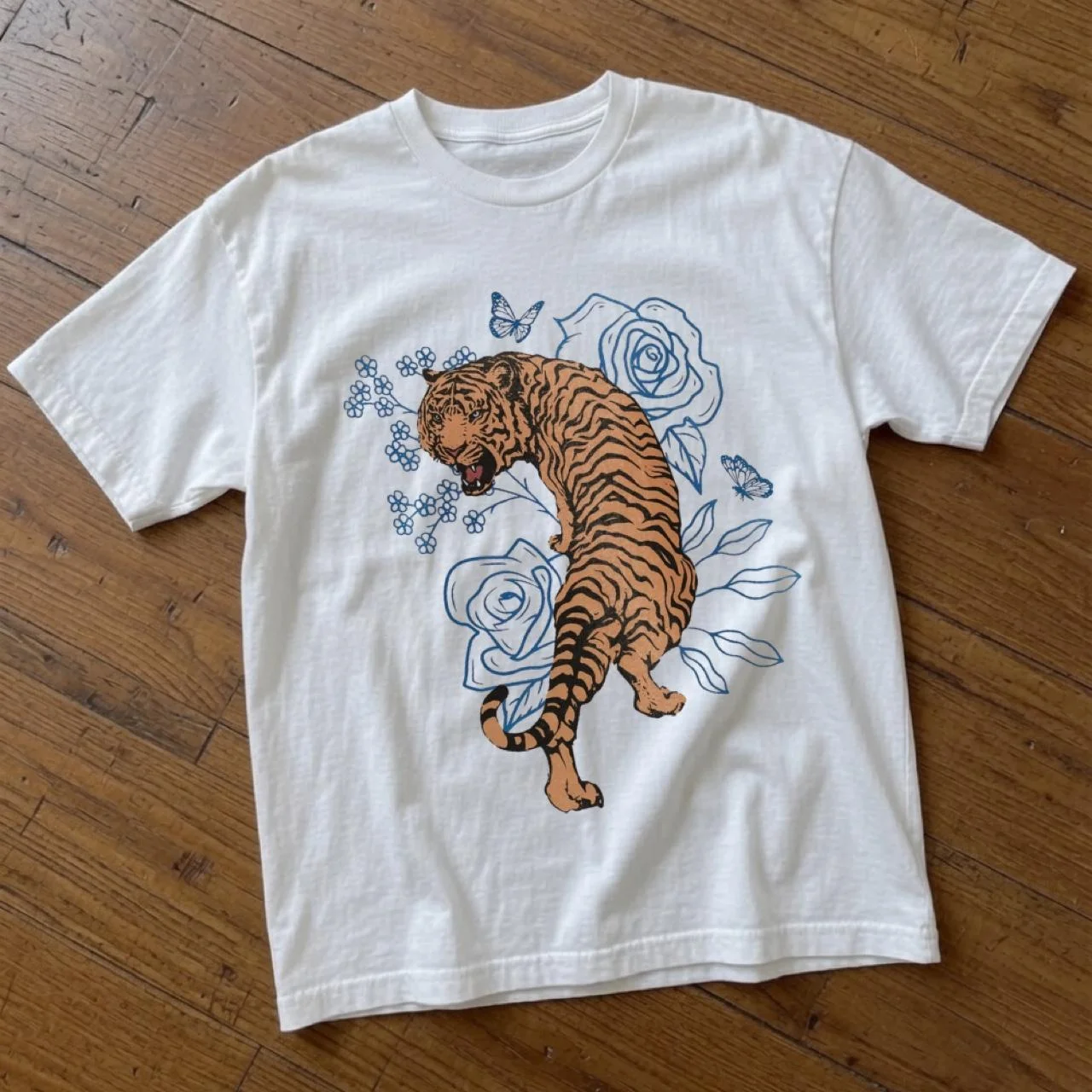 New Arrivals: Tiger-print T-shirts, '90s-inspired cropped tops, Y2K “grunge” style, and 2000s-inspired tops—unisex