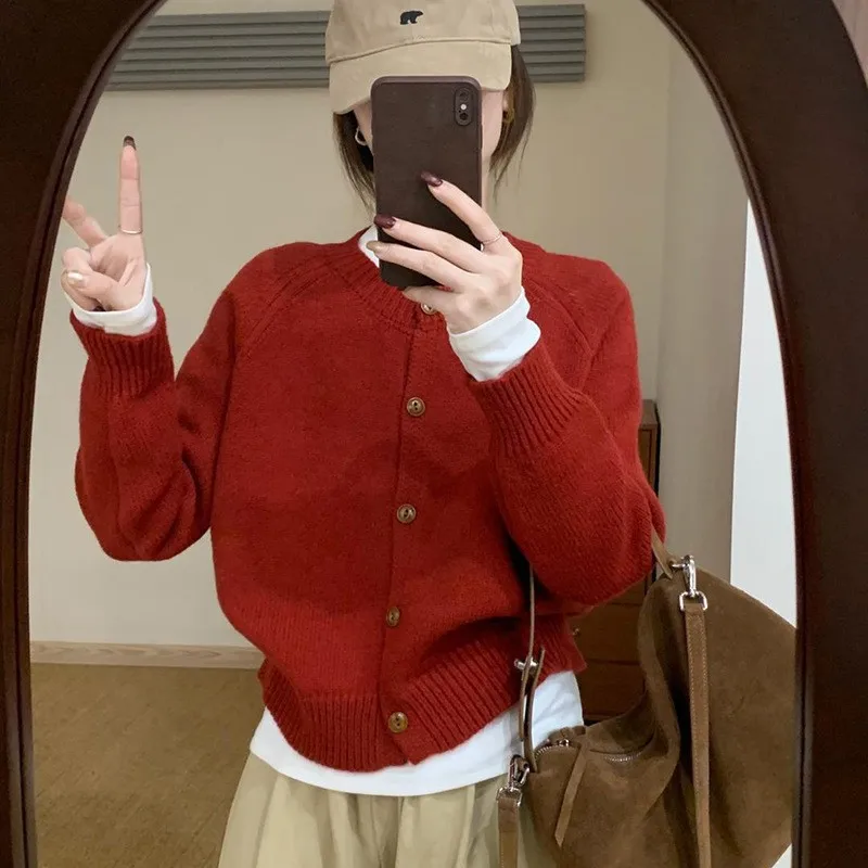 Design Sense: Solid Color, Simple Round Neck Knitted Cardigan for Women in Autumn and Winter, Lazy Style, Loose and Soft Texture 5
