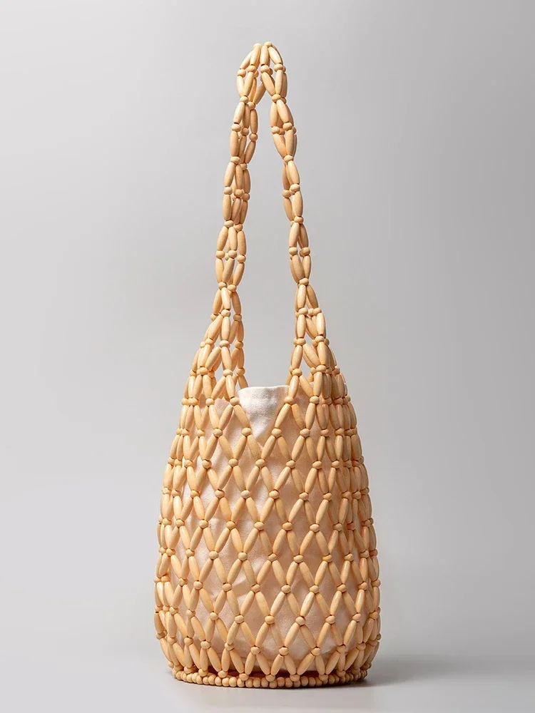 Literdesign-Sac tissé pour femme, sac seau évidé, sac à main de plage haut de gamme, sac à bandoulière, été, nouveau modèle, 2024